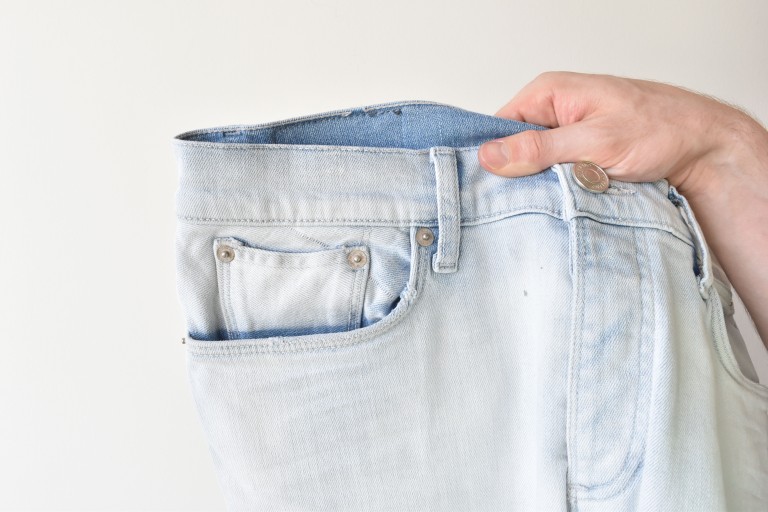 Men's white distressed jeans
